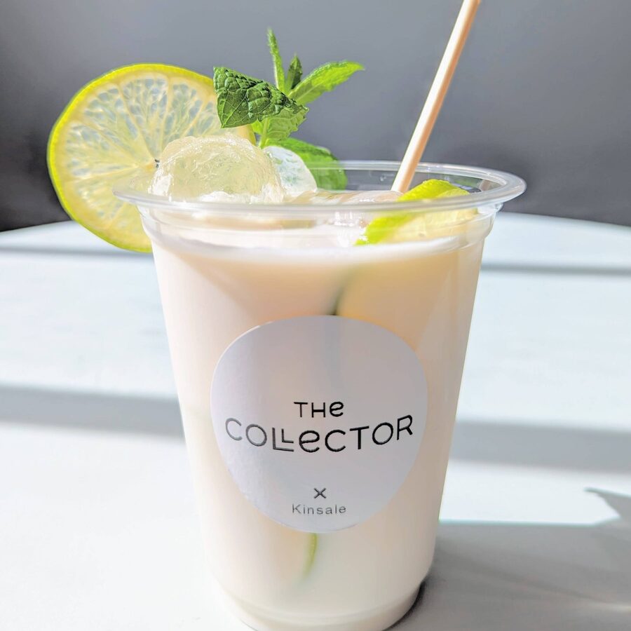 An iced coconut and lime drink in a The Collector x Kinsale cup.